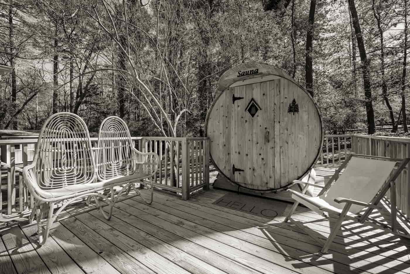 Round wooden barrel sauna standing outdoors