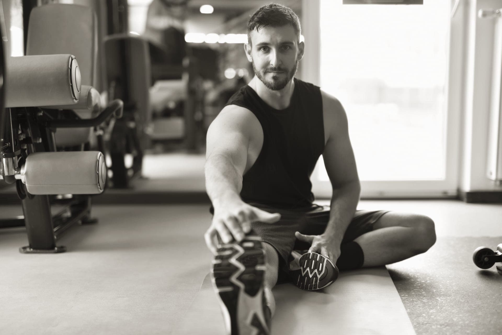 Person stretching calmly in morning light